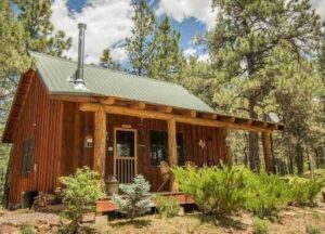 a log cabin in the woods